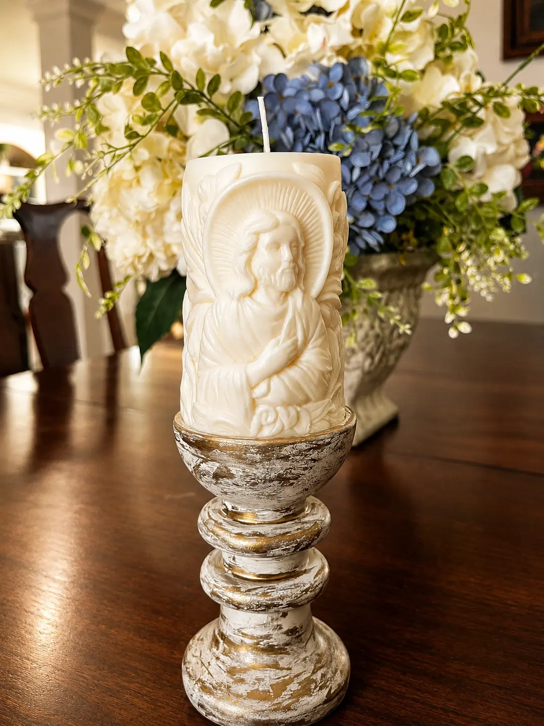 Close view of the detailed Sacred Heart pillar candle